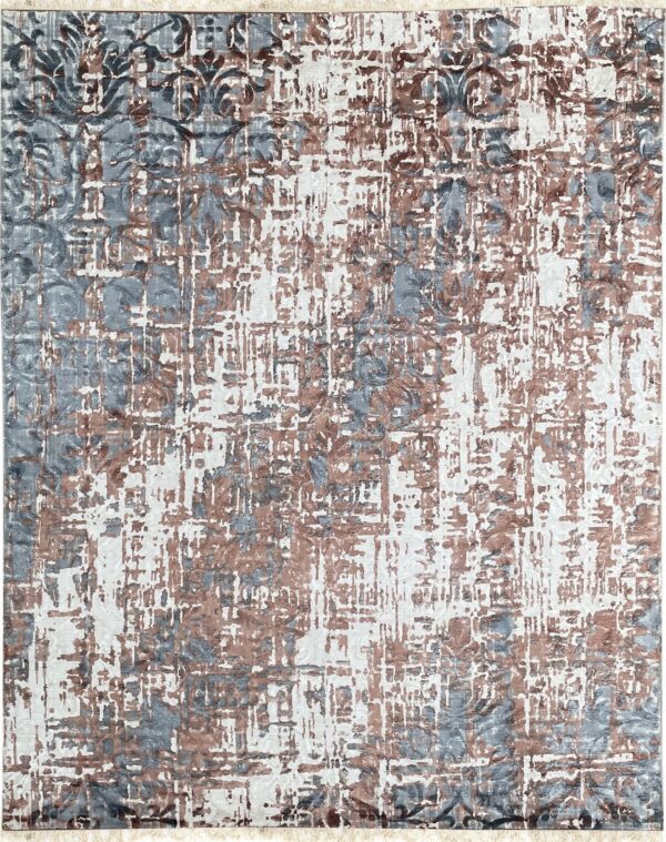 Distressed, textured rug featuring an abstract damask pattern in white, slate blue, and brown.