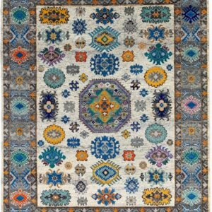 White tribal rug with scattered multi-colored medallions and a wide gray geometric border.