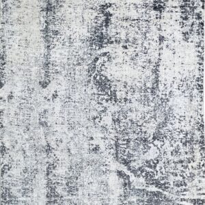 Rectangular low-pile rug with a mottled abstract design in shades of dark gray and white.