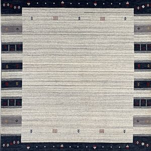 Striated gray rug with a banded border design incorporating dark blue, light gray, and small rustic motifs.