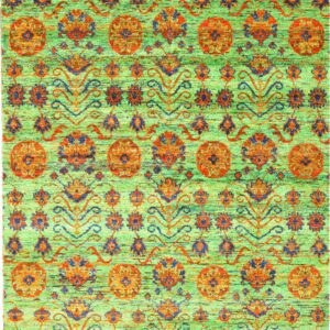 A high-contrast rug features a variegated lime green field patterned with repeating rust orange and blue medallions.