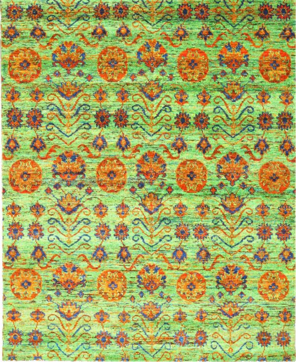 A high-contrast rug features a variegated lime green field patterned with repeating rust orange and blue medallions.