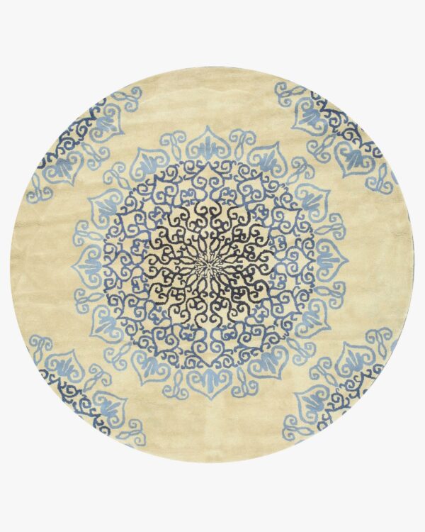 Round beige area rug with a concentric scrolling medallion pattern in light blue and deep blue.
