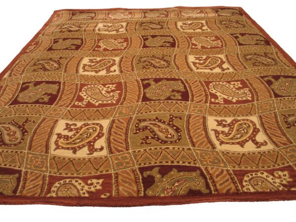 Red-brown, beige, and olive green rug featuring a patchwork grid with detailed paisley shapes.