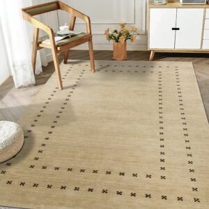Textured beige rug featuring a dark minimalist dotted border in a sunlit room with wood furniture.