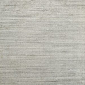 Light silver-gray rug displaying a textured, solid color field with horizontal striations.