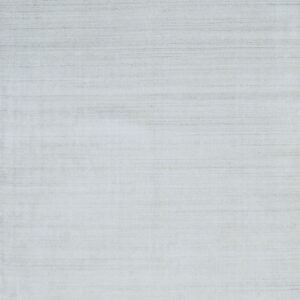 Pale gray low pile rug featuring subtle horizontal striations and a textured linear pattern.