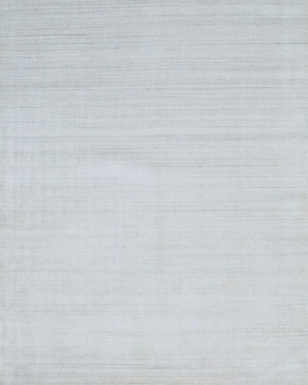 Pale gray low pile rug featuring subtle horizontal striations and a textured linear pattern.