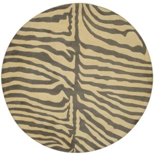Circular rug with an abstract zebra pattern featuring cream and charcoal gray stripes.