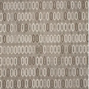Gray rug with a dense pattern of repeating cream and brown elongated geometric shapes.