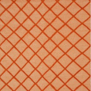 Burnt orange rug with a continuous repeating geometric pattern of white concentric diamonds.