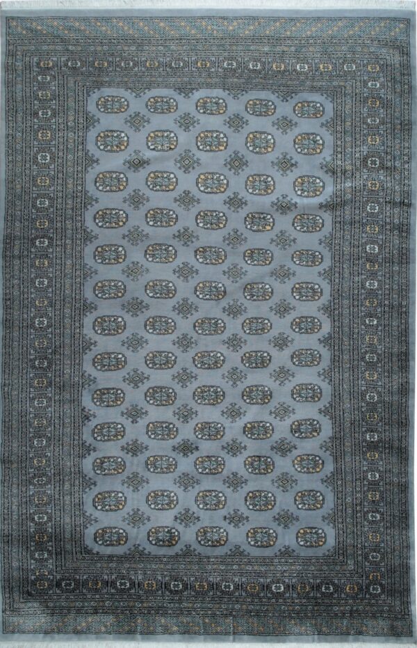 Dusty blue rug featuring traditional geometric medallions and detailed multi-banded borders in gray and yellow.