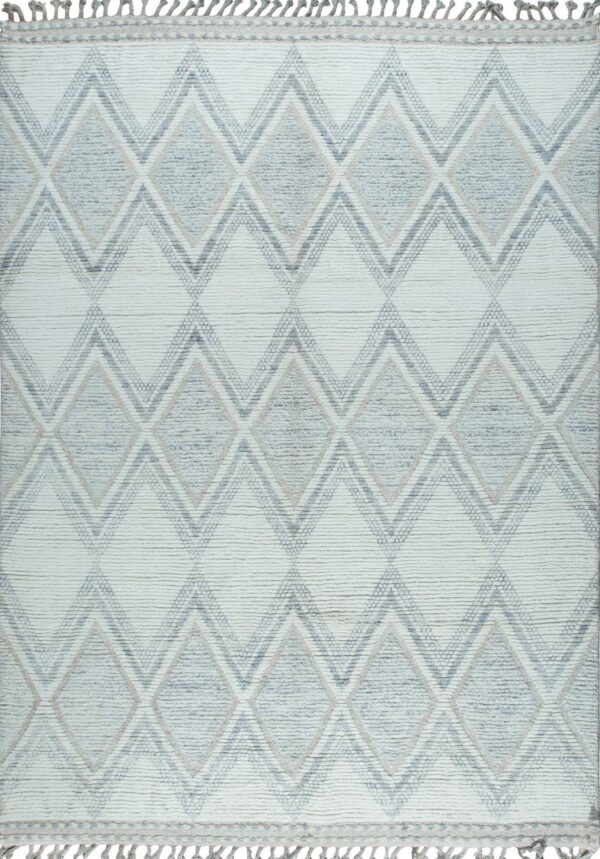 Textured ivory rug featuring geometric gray diamonds, zigzag lines, and knotted fringe edges.