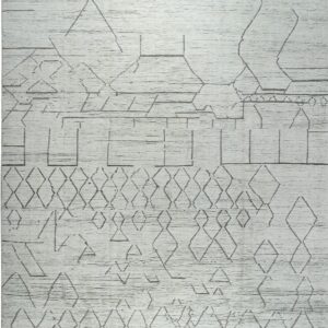 White textured rug featuring dark gray abstract geometric lines, diamonds, and fringe.