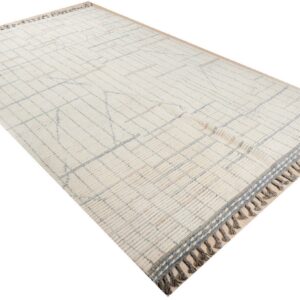 Textured cream rug featuring a subtle blue-gray geometric grid pattern and decorative fringe ends.