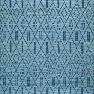 Textured blue rug with dark geometric diamond patterns and thick grey tassels on the ends.