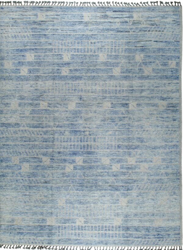Blue rug with high-low textured stripes and light-colored geometric patterns, featuring short fringe.