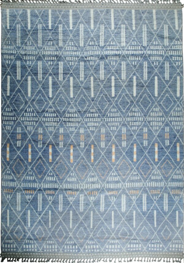 Blue textured rug featuring white geometric diamonds, vertical stripes, and small orange details.