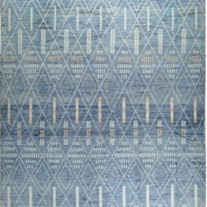 Blue textured rug displaying an abstract geometric pattern of intersecting white diamonds and peach bars.