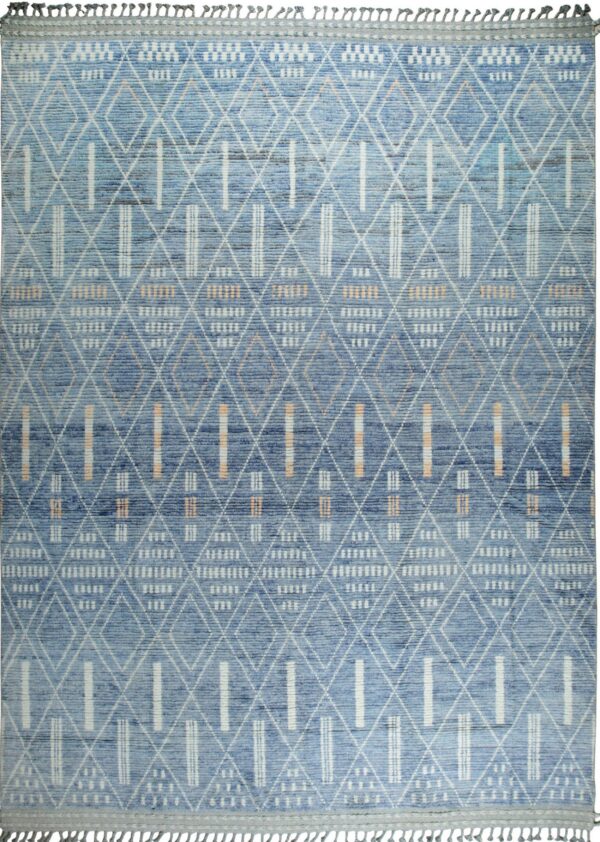 Blue textured rug displaying an abstract geometric pattern of intersecting white diamonds and peach bars.