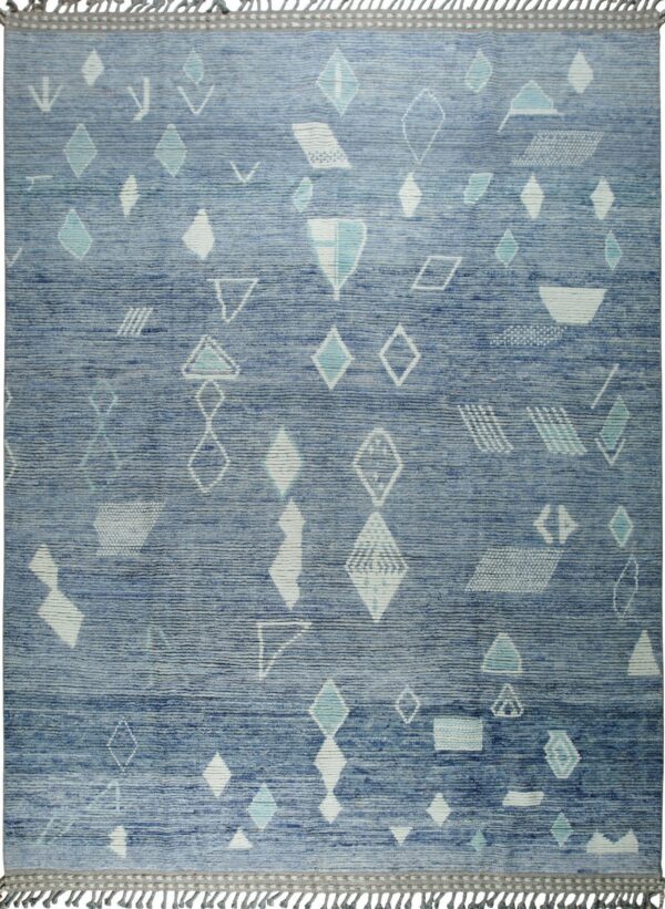 Textured blue rug featuring a scattered geometric pattern in white and light blue with braided gray fringe.