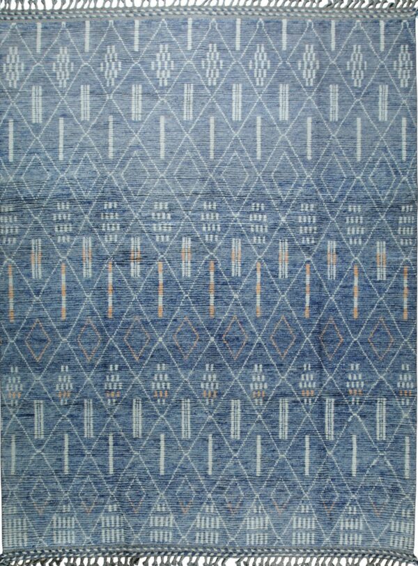 Blue textured rug featuring a white geometric diamond trellis pattern with orange vertical accents and tassels.