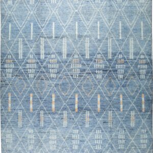 Textured blue rug featuring white diamond latticework and contrasting orange geometric motifs.