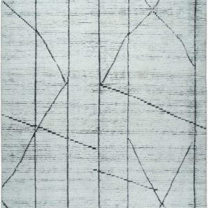 Textured white rug with thin black intersecting and dashed geometric lines.
