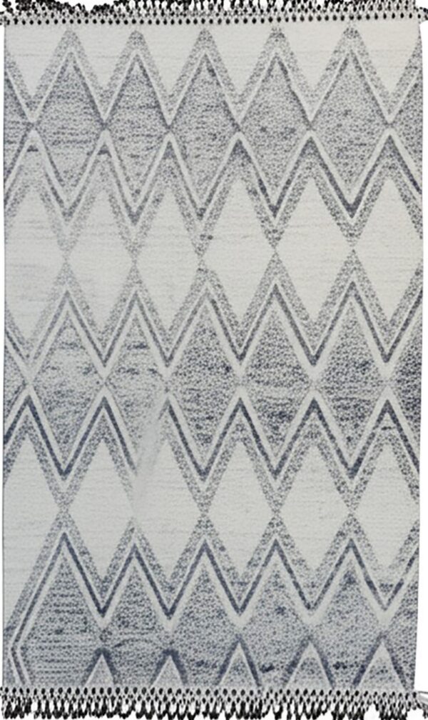 Textured white and dark blue rug with a distressed chevron pattern and dark fringe edges.