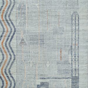 Light gray textured rug with a dark blue woven grid pattern, orange stripes, and gray fringe ends.