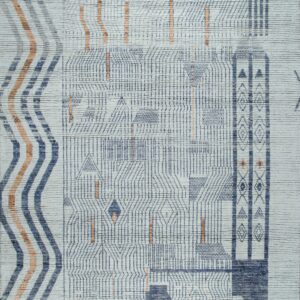 Geometric rug with textured gray surface, dark blue line patterns, and rust-colored accents.