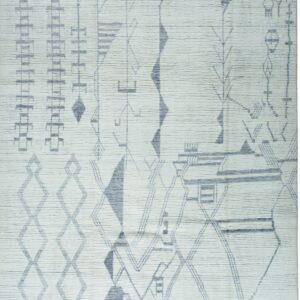 Textured off-white rug with blue-gray abstract symbols, geometric shapes, and tassels on the ends.