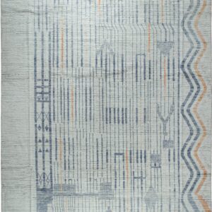Textured white rug with blue and orange abstract vertical lines, scattered geometric symbols, and tassel trim.