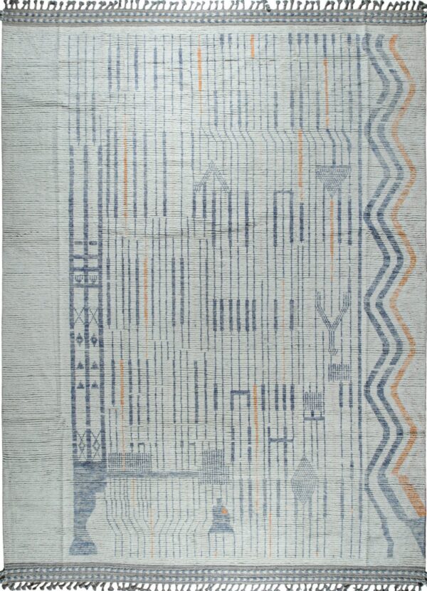 Textured white rug with blue and orange abstract vertical lines, scattered geometric symbols, and tassel trim.
