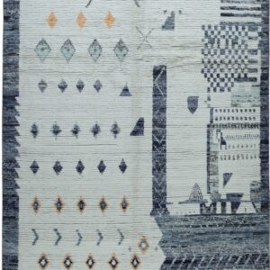 Textured rug featuring an asymmetrical abstract geometric pattern in cream, navy, blue, and orange.