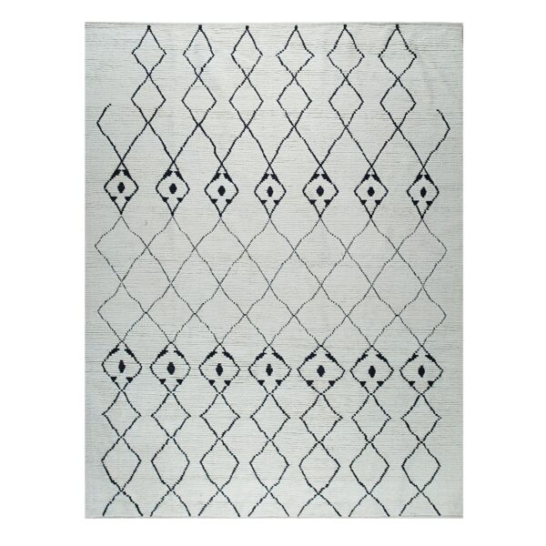 High-pile off-white rug with bold black outlined diamonds and small solid geometric geometric shapes.