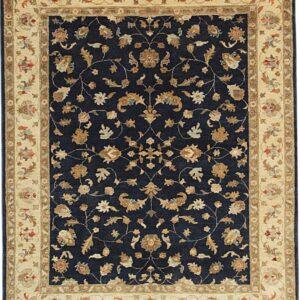 Navy blue rug with intricate gold and cream floral motifs and a detailed wide beige border.