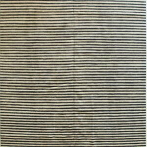 A low pile area rug featuring alternating thin horizontal stripes in dark brown and pale tan.