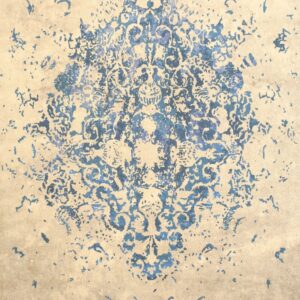 Beige rug with a distressed blue abstract pattern radiating from a central ornamental motif.