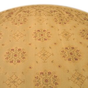 Round gold rug with a low pile features a repeating pattern of burgundy, green, and tan floral designs.