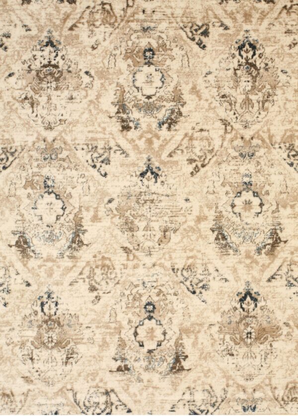 Distressed ivory rug with repeating traditional patterns in shades of beige, brown, and navy blue.