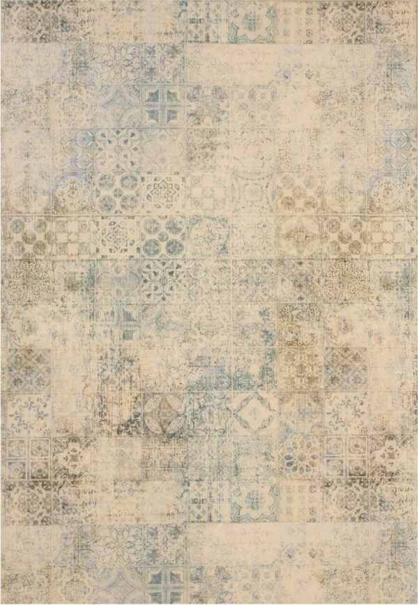 Distressed rug with an antique tile patchwork pattern in cream, faded blue, and olive green.