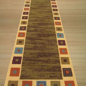 A long runner rug on light wood flooring features a mottled green center framed by a tan border with multicolored squares.