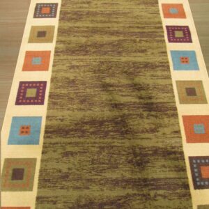 Green and brown striated rug with a cream border containing large multicolored geometric squares on wood flooring.