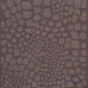 Muted gray-brown rug features an abstract pattern of irregular taupe shapes converging toward the center.