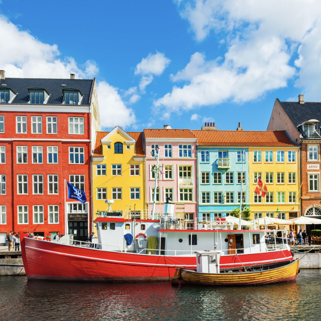 Red and white boat floating in the bay of scandinavia