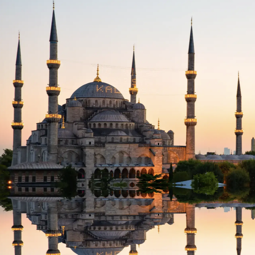 Blue mosque reflecting at sunset