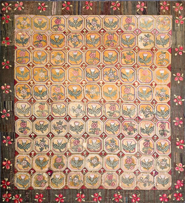 Square rug with a golden octagonal field pattern featuring thistles and roses, framed by a dark floral border.