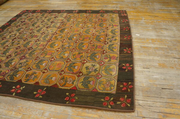 Mustard and green rug featuring an octagonal floral lattice pattern and a wide dark brown border on distressed wood floors.