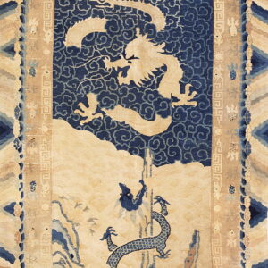 Traditional blue and beige rug featuring a detailed celestial dragon over a scenic mountain landscape.